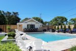 Amazing inground pool with cabana bar & plush seating